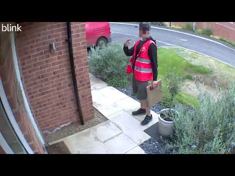 Shocking video shows moment postie smokes on the job while swearing at polite request