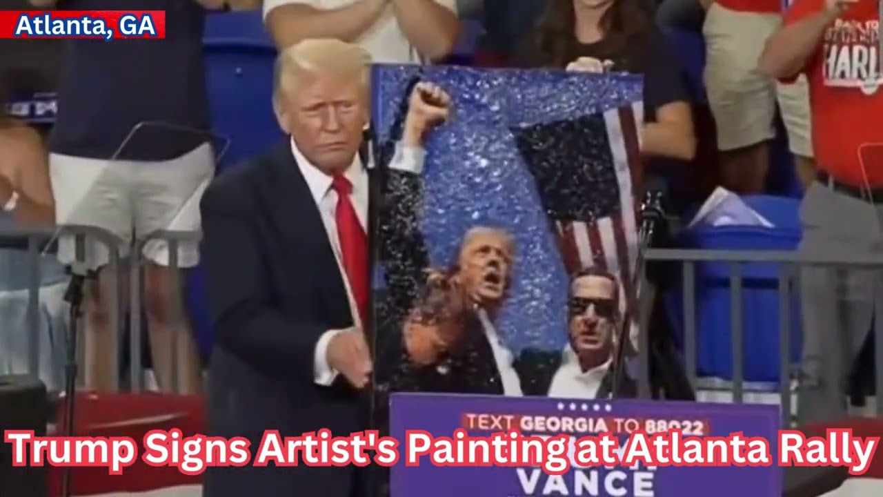 Trump Signs Artist's Painting at Atlanta Rally