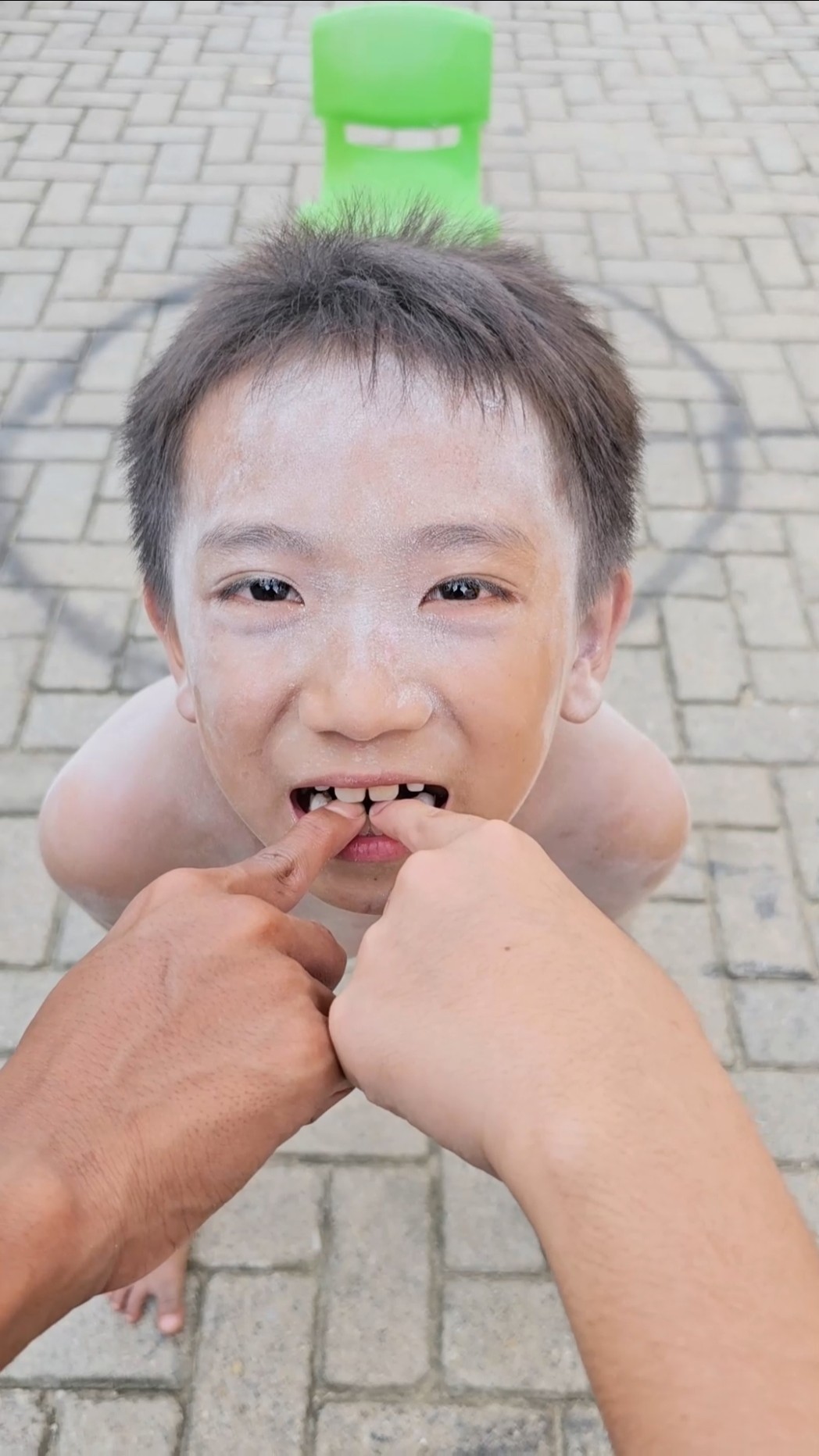 Crying because he was bitten by a child