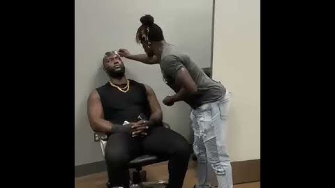 R Truth tries to steal Omos