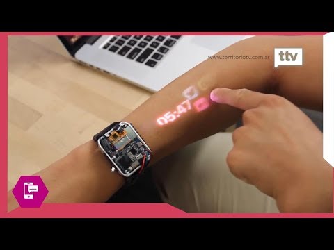 Reloj proyector touch, circuitos en la mano, colección de latas y Ant-Man y  la Avispa 