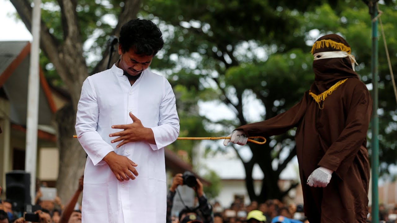 Two Men Publicly Caned In Indonesia For Having Gay Sex Youtube