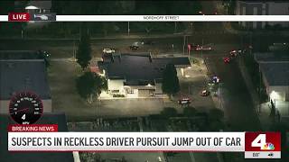 Suspects in reckless driving pursuit jump out of car and flee in Canoga Park