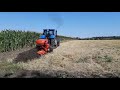 Вспашка земель, пахота оборотным плугом на тракторе New Holland T7060