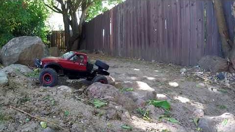 WPL C14 short crawl with cantilever rear suspension.