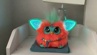 Furby 2023 on a Bedside Table