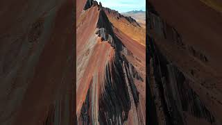 “Rainbow Mountain” is a stunning natural wonder not to be missed! 🌈