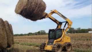 Unloading straw.