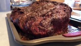 Rinse your prime rib and pat dry trim the fat rub with a base mustard
to adhere seasoning rim stake of yo...