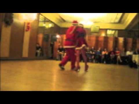 Sidney Grant and Gayle Madeira dance Argentine tango at Milonga Rosa's holiday party