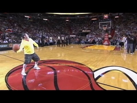 Michael Drysch Sinks Half Court Basket, Lebron James Helps Him Celebrate