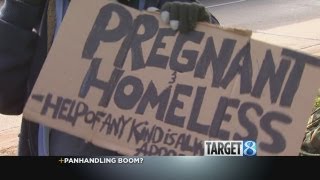 More panhandlers at work along 28th St.