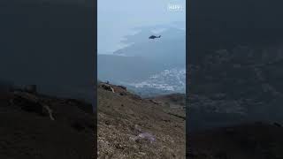 Hong Kong Govt Helicopter Promotes Election To Lantau Hikers