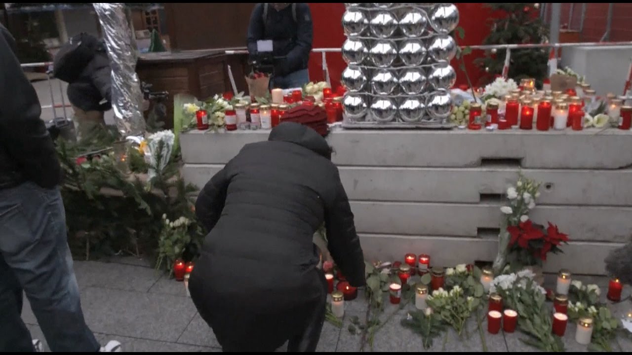 People Mourn Victims of Berlin Christmas Market Attack