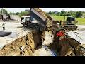 Incredible Deep Trench Land Filling Up Use Bulldozer KOMATSU D53P and 12 Wheel Hyundai Dump Truck