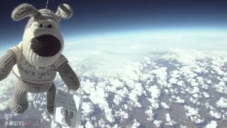A cuddly toy puppy sent into the stratosphere for my newly born nep...