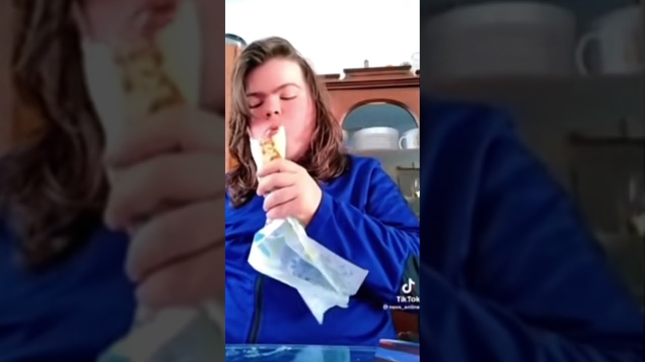 A burrito with sausage it’s getting hot let me take off my shirt