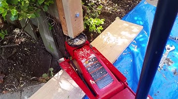 Removing a 4x4 fence post using a car jack