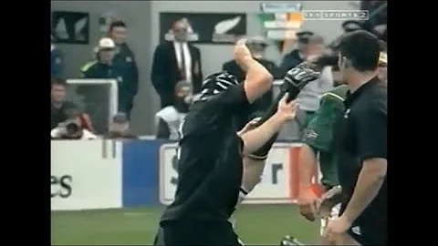 Josh Kronfeld tips over a big South African prop