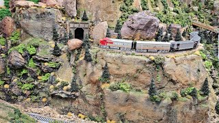 NScale Train snaking up to a 90 year old trestle, speed limit 5 MPH! Mountains, canyons, waterfalls