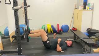 Banded Feet Elevated Hamstring Bridges