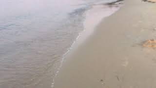 Relaxing waves at Vourvourou beach, Sithonia, Greece