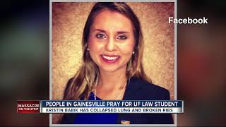 People in Gainesville pray for UF law student