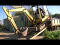 Unloading Digger & Full set of buckets from lorry HD