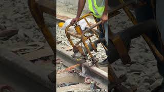 Fixing tracks, ensuring safety.🛠️🚆||RRBD #railways #trackmaintenance #civilengineering #railwaylife