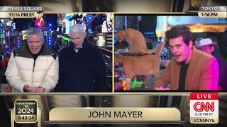 Anderson Cooper can't stop laughing at John Mayer in a cat bar