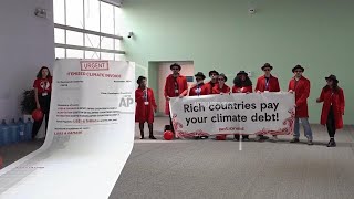 Global South activists join COP29 demonstration calling for adequate climate finance