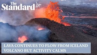 Lava continues to flow from Iceland volcano but activity calms significantly