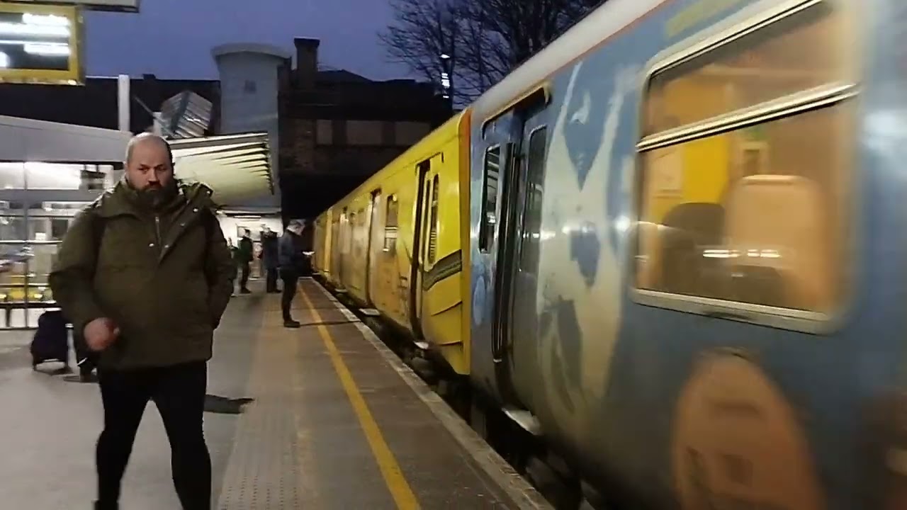 Multi liveried set of class 508s arriving into Waterloo (Merseyside)