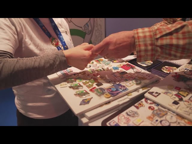 Olympic pin trading brings fans together in Milan, turning