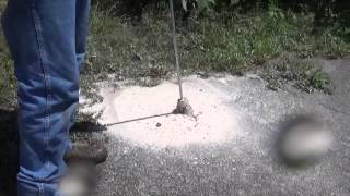 Cutting through asphalt with Hydro Excavation