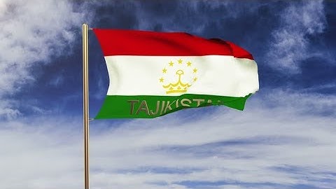 4K Tajikistan flag with title waving in the wind. Looping sun rises style. Animation loop Stock