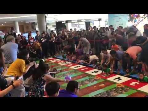 Babies racing in the Diaper Dash