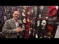 A closer look at ghostface masks on the funworld stand at the halloween  party expo