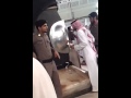 Spraying Perfume On Hajar Aswad
