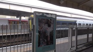 SWR class 159 and 158 passing and London Tramlink Stadler Variobahn departing Wimbledon