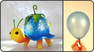Hi, in this video tutorial I show you how I made a turtle shaped lamp using a balloon as a base, some cardboard for the paper clay 