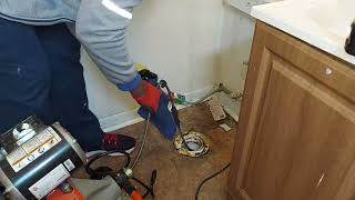 UNCLOGGING A TOILET DRAIN! How to snake a toilet pipe