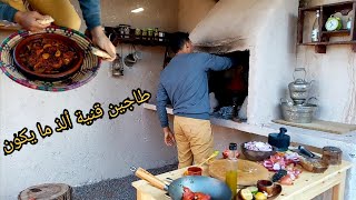 طاجين قنية(أرنب)بالبصلة الزبيب