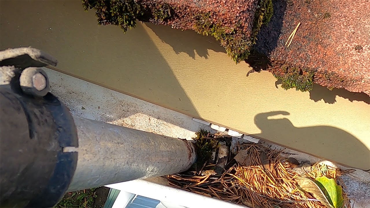 Drøbak - rens av takrenner