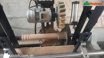 MÁY TIỆN CNC 2 TRỤC NẠP PHÔI TỰ ĐỘNG + CHÀ NHÁM TỰ ĐỘNG WOODMASTER