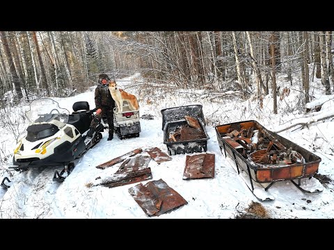 Видео: ЗА МЕТАЛЛОМ НА СНЕГОХОДАХ. ВОЛКИ СНОВА РЯДОМ С ДЕРЕВНЕЙ.