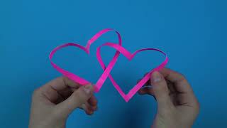 Magic Heart Love Test - using two strips of paper, tape, and scissors.