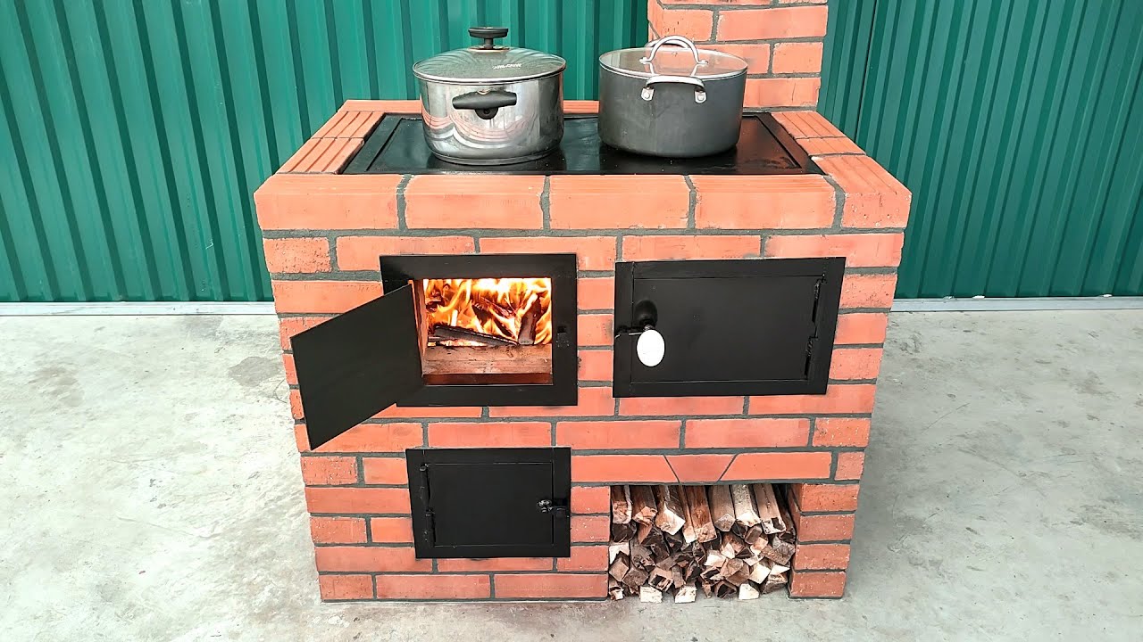 Wood stove with beautiful oven made of a mixture of cement clay and red  bricks 