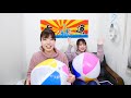 ビーチボールの膨らませ競争