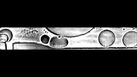 Chemically induced coalescence in droplet-based microfluidics